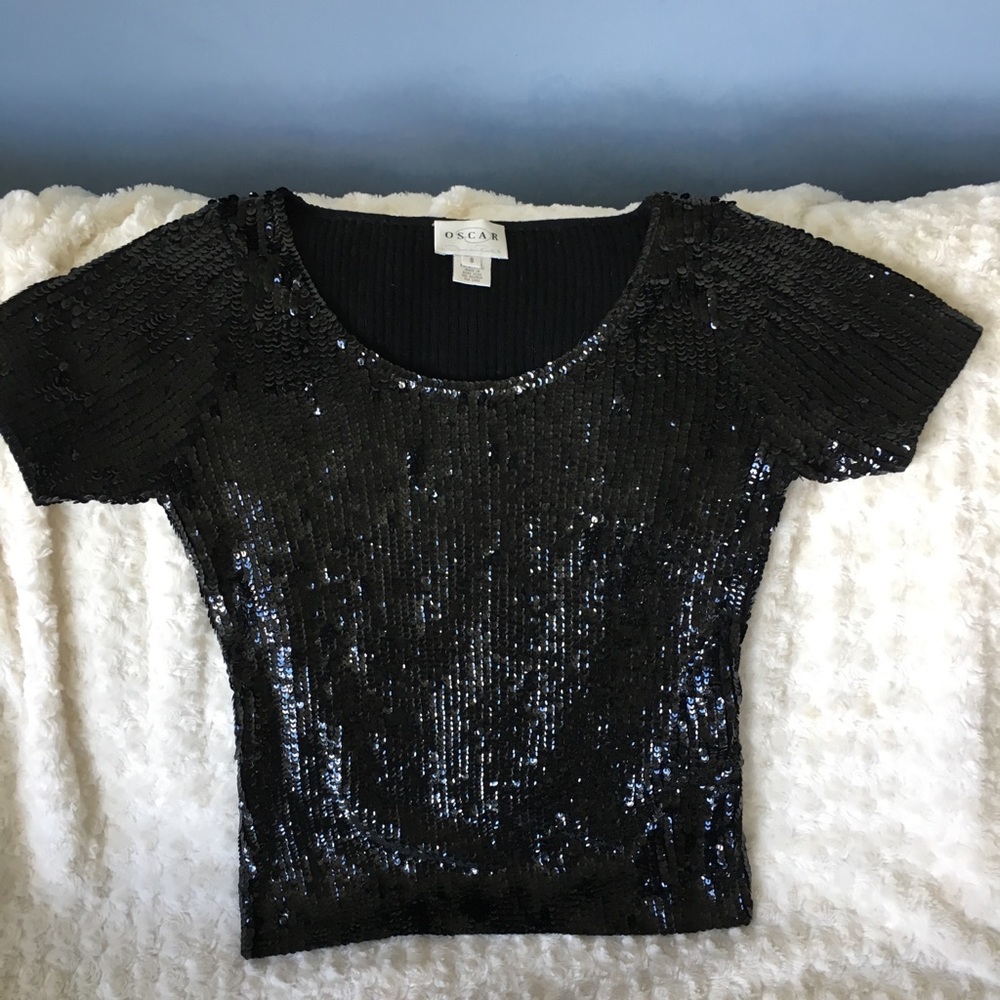 Oscar de la Renta sequined sweater.